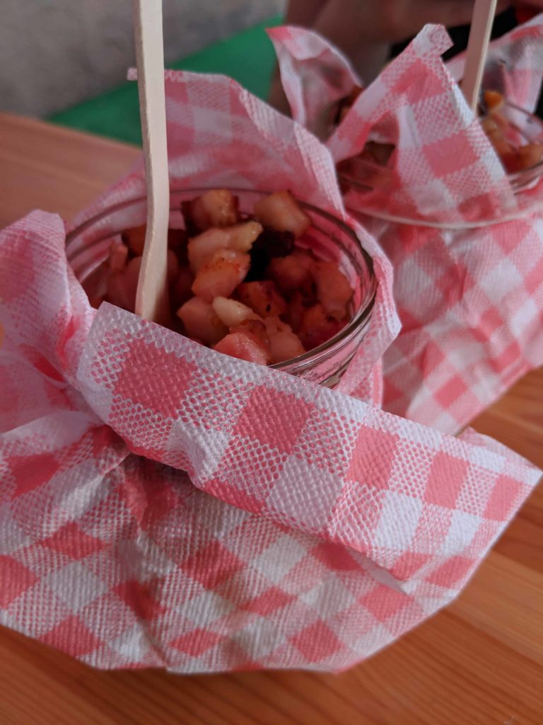 Traditional Polish food in glass jars with a red and white napkin around it