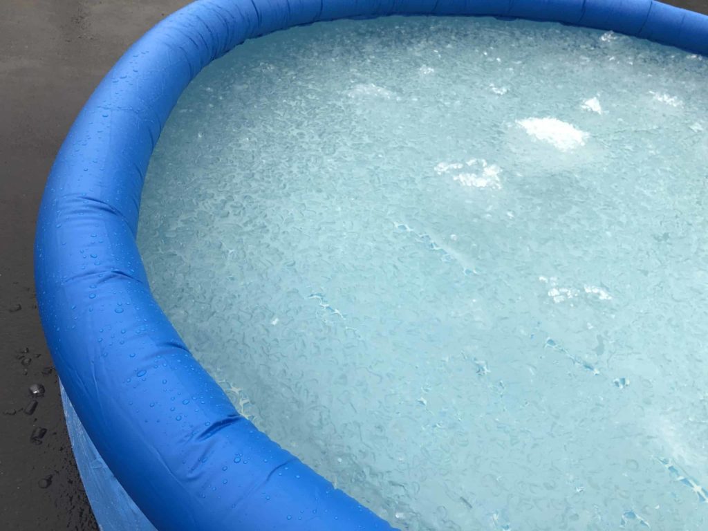 Blue pool filled with ice
