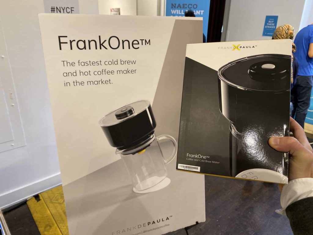 Holding the FrankOne box coffee maker at New York Coffee Festival