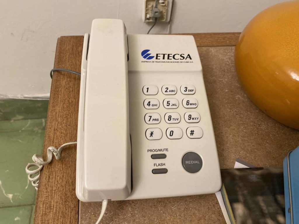 White telephone handset with large buttons