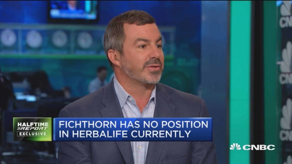 picture of John Fichthorn on CNBC with a blue chiron (sp?) underneath