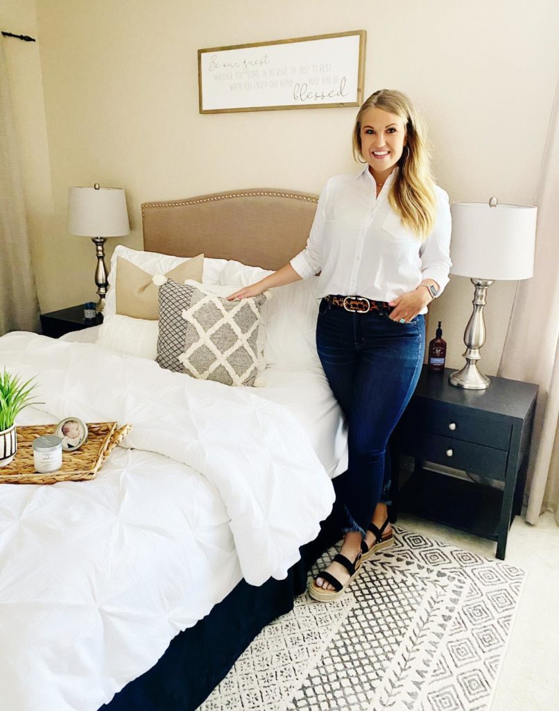 Amanda Kay in a bedroom, she is a professional organizer and home stylist