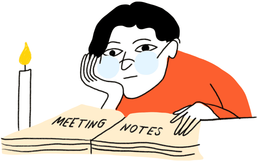 A dark haired fellow in glasses is hunching over a large book. Meeting notes i written on the book. He seems very bored. A candle is next to him. 