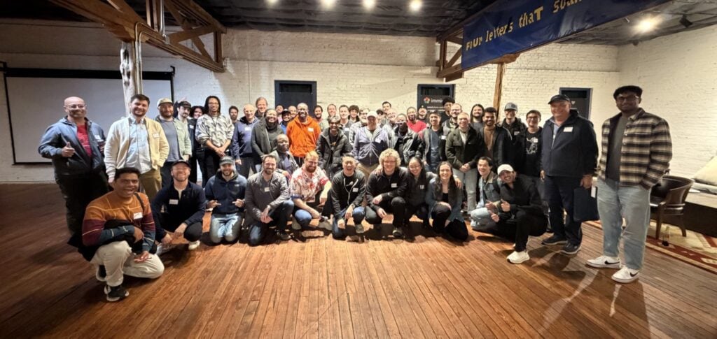 group of people inside a loft space